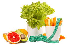 Picture of Celery, Carrots, avocado, grapfruit and tape measure,